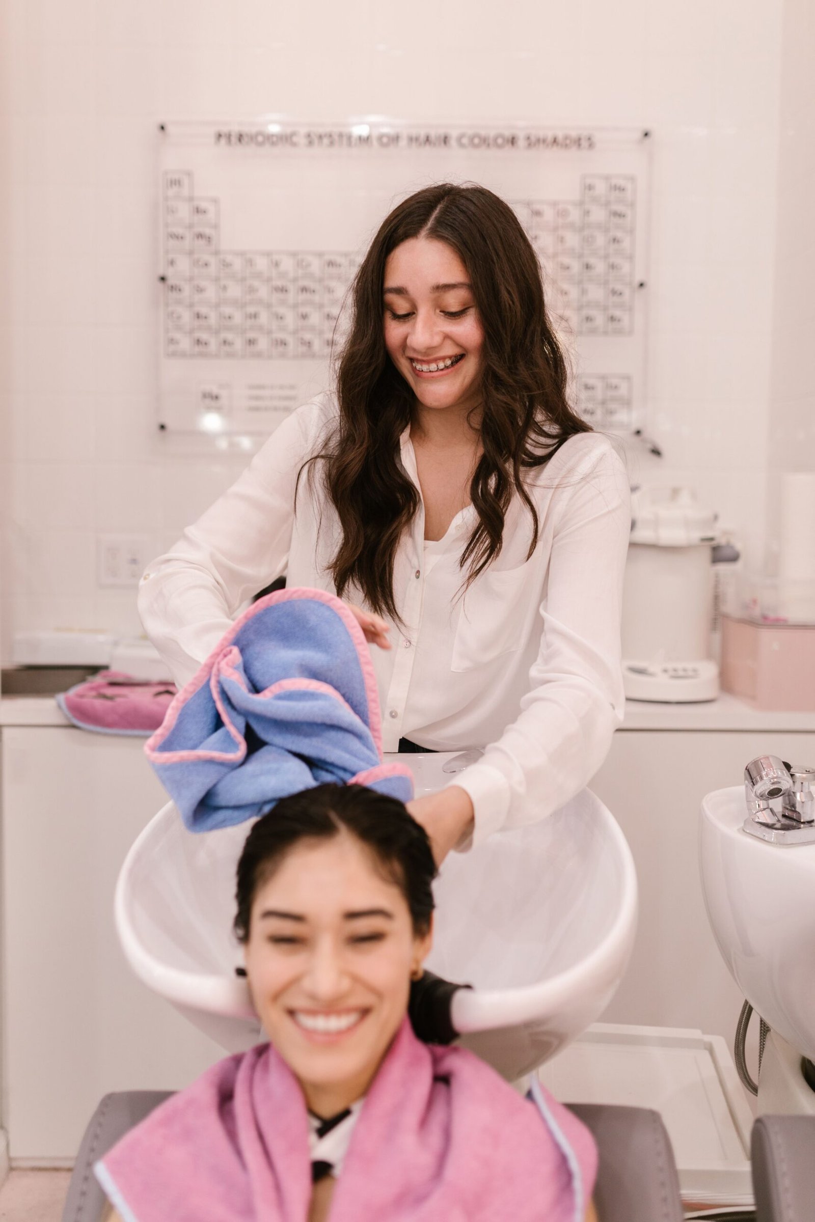 Happy customer enjoying successful beauty salon results.